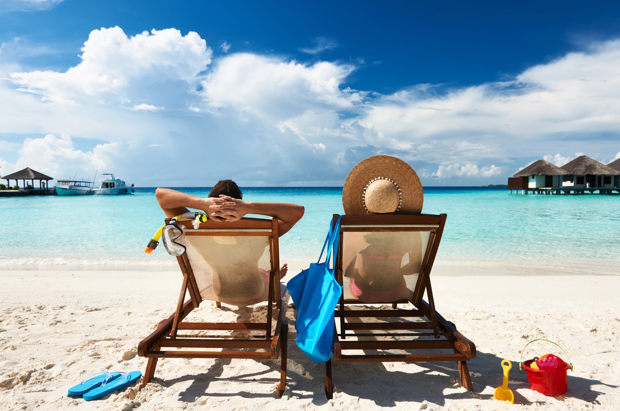 couple in charis on beach
